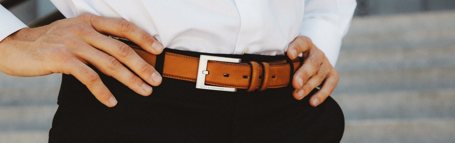 Waist view of man wearing stealth leather belt in honey